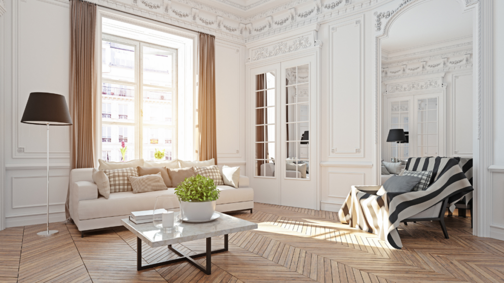 Jasny salon z elegancką sztukaterią i sofą