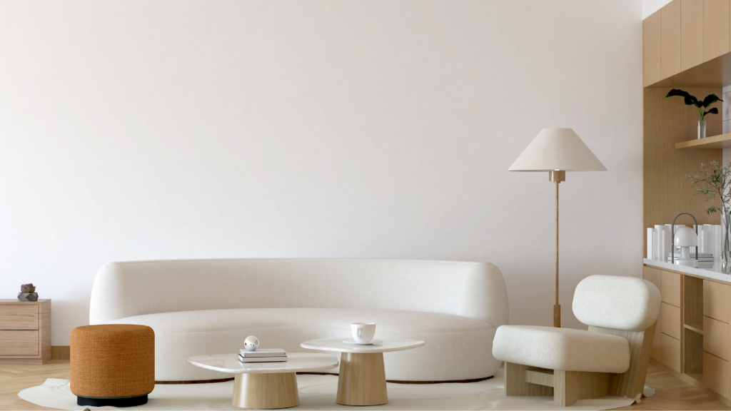 Jasny salon w stylu mid century modern z zaokrągloną kremową sofą